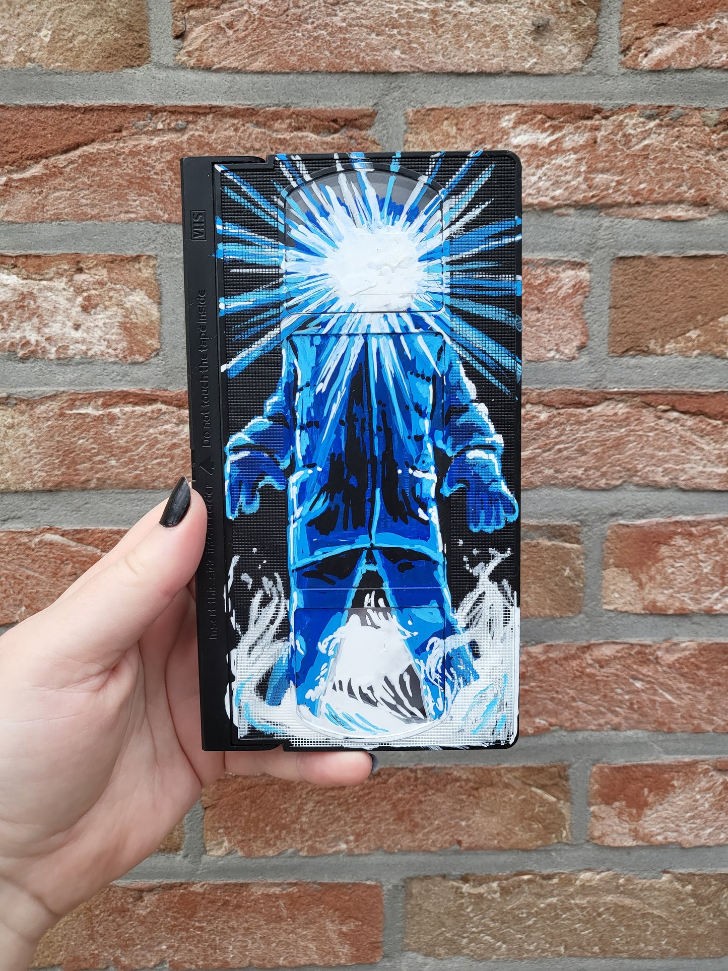Upcycled VHS tapes - painting